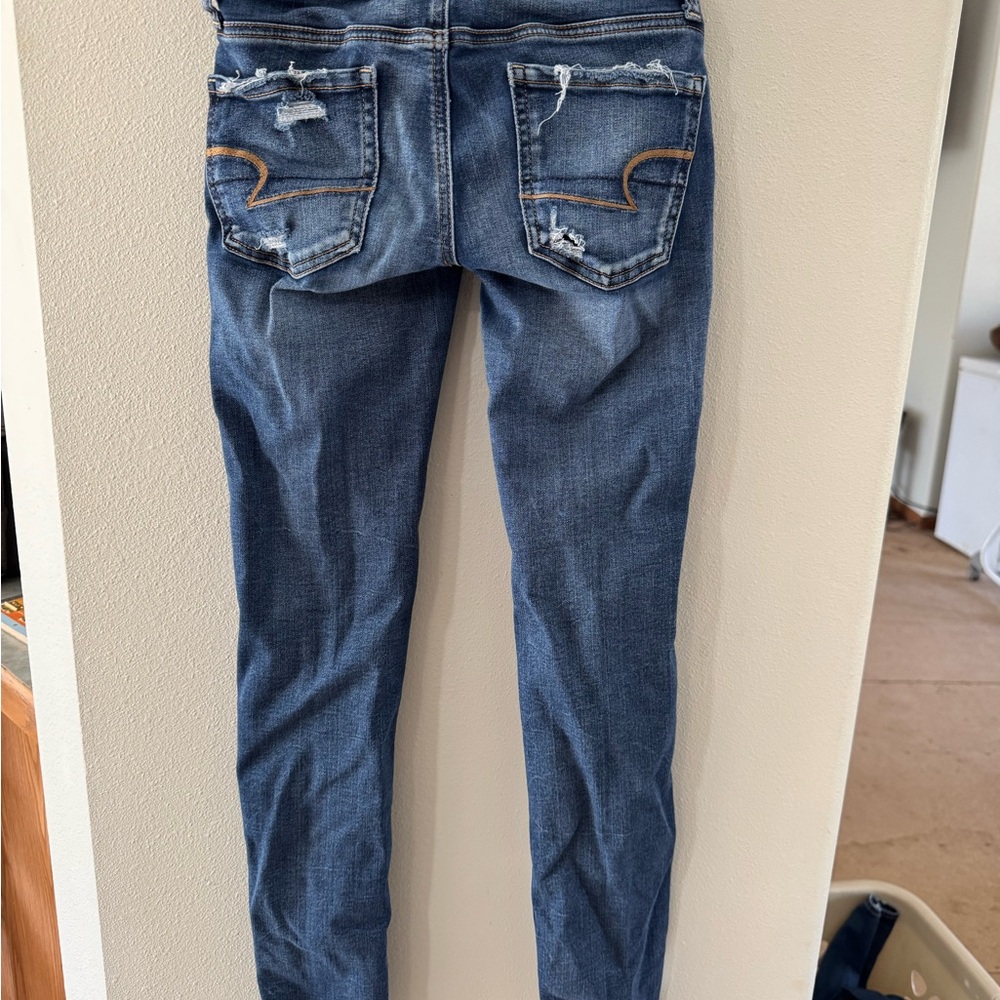 Distressed Blue Jeans - Picture 2 of 3
